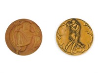 (2) bronze medals from the Society of Medalists.