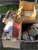 Lot with boxes including wall clock, toys, doll cl