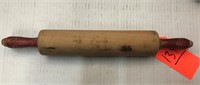 vintage red handle rolling pin