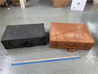 2 old suitcases