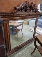 Heavily engraved mirror