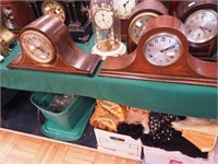 Two camel-back mahogany striking clocks;