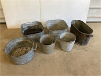 Galvanized tubs and pails.