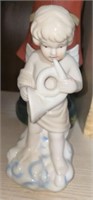 Porcelain Cherub with Horn Figurine
