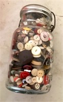 Canning jar filled with buttons