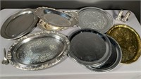 Lot of serving pieces including silver plate