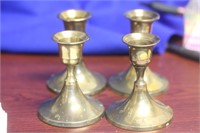 A Lot of 4 Brass Candle Holders