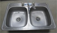 Dual bowl stainless steel sink. Measures 33" w x