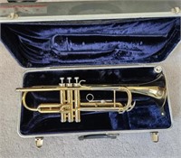 Conn trumpet & case, some dents