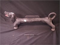 Vintage boot scraper in the form of a dachshund,