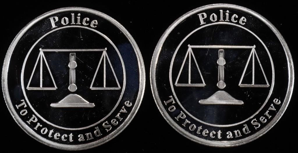(2) 1 OZ .999 SILVER POLICE ROUNDS