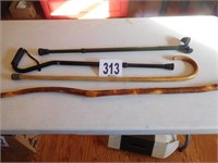 4 WALKING STICKS (1 IS FROM PITTS & DURHAM REALTY