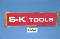 "SK Tools" masonite sign, 14" x 4"