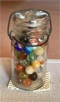 Vintage glass jar - filled with marbles -