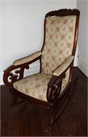 Empire Mahogany rocking chair with carved crest