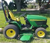 John Deere 4110 utility tractor with deck