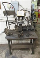 Coll-crimp model# T-400 on stand with cart.