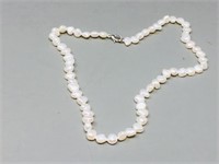 strand of cream colored baroque pearls