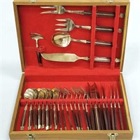 29 pieces of brass plated nickel flatware set with