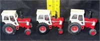 3 small international tractors