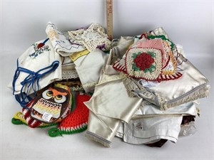Assorted linen, doilies and crocheted items.