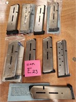 P - LOT OF 9, 10MM AMMO MAGS (E23)