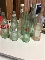 Coke - assorted empty bottles