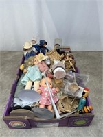 Assortment of dolls and some doll furniture