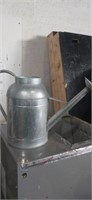Galvanized water can