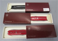 (3) Victorinox folding knives in original boxes.