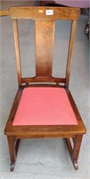 Antique walnut upholstered seat rocker
