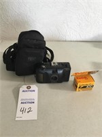 Vivitar 25 mm camera; TEK camera bag; 35mm