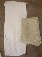 White blanket and cream afghan throw