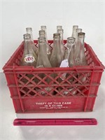 Crate of Glass Vess and Galaxie Bottles
