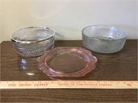 Glass serving bowls and pink rack