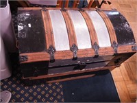 Dome-top trunk with wooden strapping, repainted
