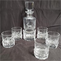 Etched whiskey decanter with glasses