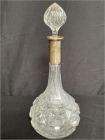 Crystal decanter with sterling silver neck