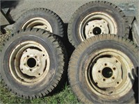 four used tires & rims
