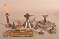 Grouping of Antique Tin and Brass Candle Items.