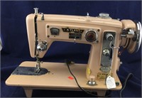 Pink Vintage Electric Atlas Sewing Machine.