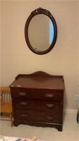 Small wooden chest of drawers with mirror