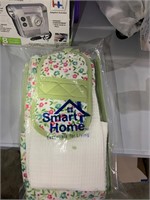 green dish towels and potholders new in package