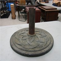 Cast umbrella base.