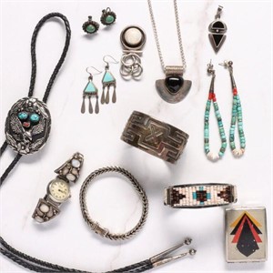 A COLLECTION OF NATIVE AMERICAN STERLING JEWELRY