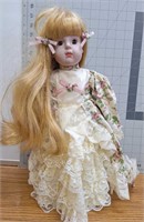 Porcelain doll with stand