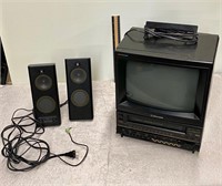 Tv with VCR and speakers