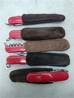 5 pocket knives in pouch
