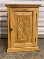 Pine cupboard with tree of life carving