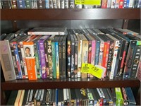 SHELF WITH VCR AND DVDS MISC TITLES AND AUTHORS